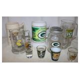 5 Green Bay Packer Mugs & 4 Shot glasses: