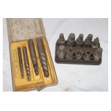 14 Screw Extractors (1 is a 10 pc. Set)