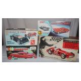4 Opened Vintage Car Model Kits: