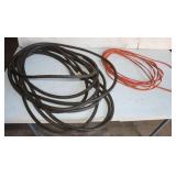2 Extension Cords: 1) Black Heavy Duty, 1) 14 GA