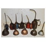 11 oil Cans: 5) Eagle, 6 are Thumb Pumpers
