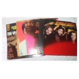 8 Vinyl Records: