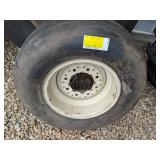 12.5L-15 new Firestone tire on 8-bolt rim