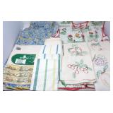 Assortment of Kitchen Towels, Aprons & Shelf