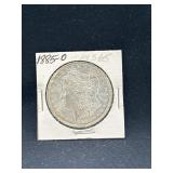 1885 O Morgan silver dollar