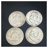 Group of 4 Ben Franklin silver half dollars