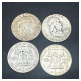 Group of 4 Ben Franklin silver half dollars