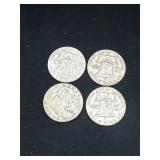 Group of 4 Ben Franklin silver half dollars
