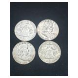 Group of 4 Ben Franklin silver half dollars