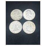 Group of 4 Ben Franklin silver half dollars