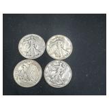 Group of 4 Walking Liberty silver half dollars