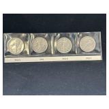 Group of 4 Walking Liberty silver half dollars