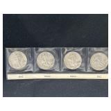 Group of 4 Walking Liberty silver half dollars