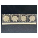 Group of 4 Walking Liberty silver half dollars