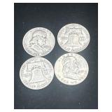 Group of 4 silver Ben Franklin half dollars