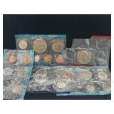 Group of mint sets that have been cut open