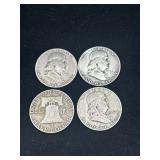 Group or 4 silver Ben Franklin half dollars