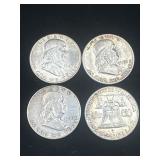 Group or 4 silver Ben Franklin half dollars