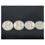 Group of 4 silver Ben Franklin half dollars
