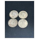 3 1964 Kennedy silver half dollars along with a