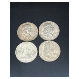 Group of 4 Franklin silver half dollars