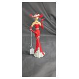 Model in red dress figurine approx 10 inches tall