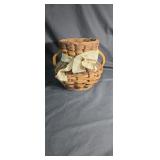 Nice 2 handled basket approx 10 inches tall