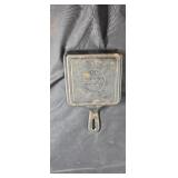 Lodge square cast iron approx 5.5 inches square