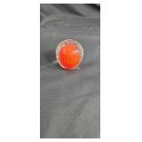 Red and clear paper weight