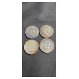 Franklin half dollars 1950, 1958, 1958, 1951