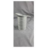 Mid century tin measuring cup