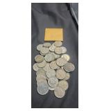 Approx 42 nickels and a 1969 Canadian quarter
