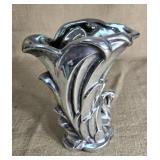 Beautiful silver colored vase 9 inches tall.