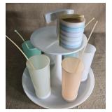 Mid century modern Tupperware iced tea set.