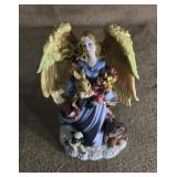 Angel figurine 8 inches tall.