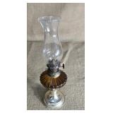 Amber and clear oil lamp. 10 inches tall.