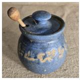 Hand made pottery bowl with lid 5 inches tall.