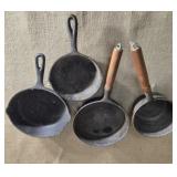 4 cast iron skillets and pots one is made in USA.