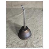 Oil can 7 inches tall.