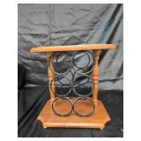Wine rack holds 6 bottles of wine.