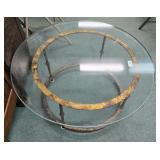 Round glass top table. 33 diameter  X 16 inches