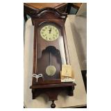 Hamilton wall clock 11.5 X36 inches tall. To be
