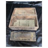 Box and sharpening stone. Stone is broke.