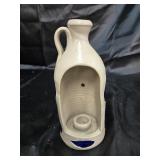 Pottery candle holders. 9 inches tall.