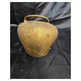 Large brass colored cow bell complete with
