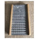 Antique hosiery washboard. 7 inches by 4.5