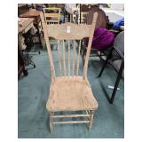 Pressed back oak chair in middle of being g