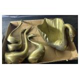 5 brass swans