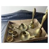 brass bells, candle holder, and napkin rings