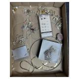 Flat of costume jewelry